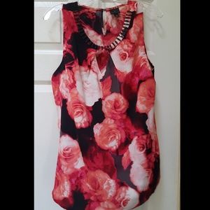 Very elegant rose tank with need detail